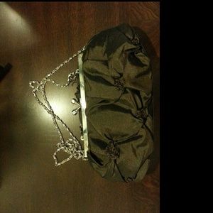 Brown clutch w/strap never used