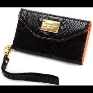 iPhone 5 Michael Kors wristlet.