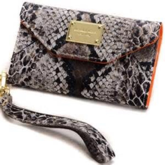 Snake skinned Michael Kors wristlet.