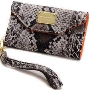 Snake skinned Michael Kors wristlet.