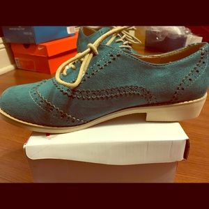 Teal lace up shoes