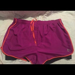 Purple, gray and coral RBX workout shorts