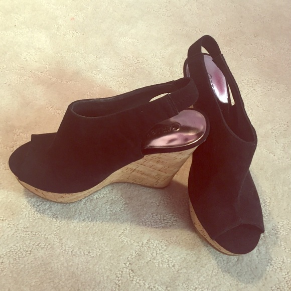 Carlos Santana wedges