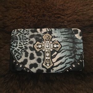 Leopard jeweled clutch with leather detail
