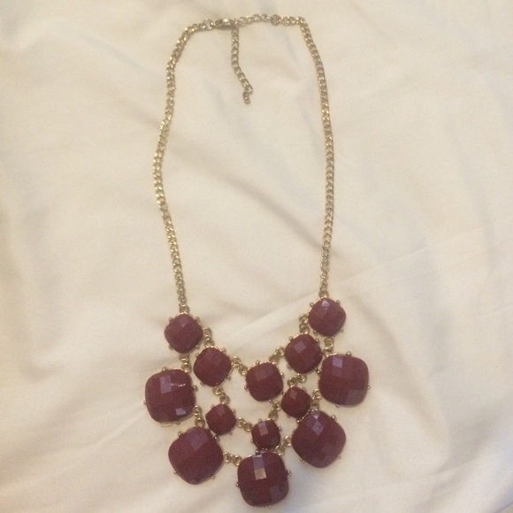 Statement necklace. Deep red with gold accents.