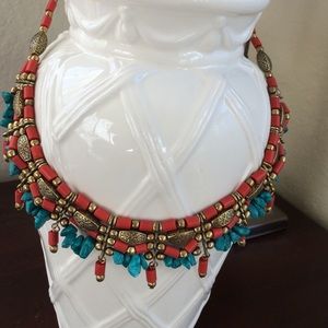 Necklace, with metal, resin and coral beads