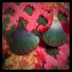 Signed, and etched titanium earrings.