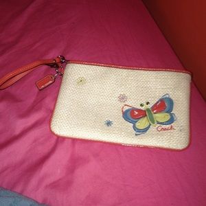Limited edition Coach butterfly motif wristlet