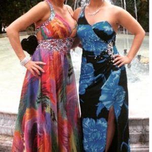 The blue and black one shoulder gown