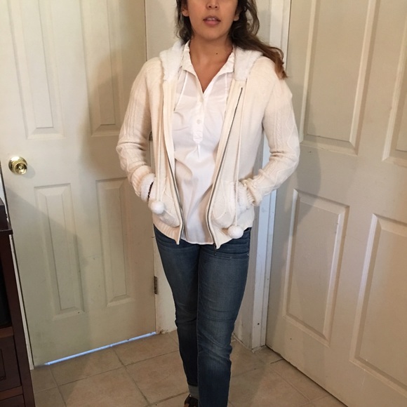 White sweater with Pom poms