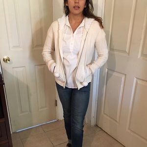 White sweater with Pom poms