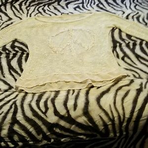 Cute sheer beige sheer shirt with peace sign.