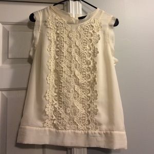 Cream colored dress shirt.