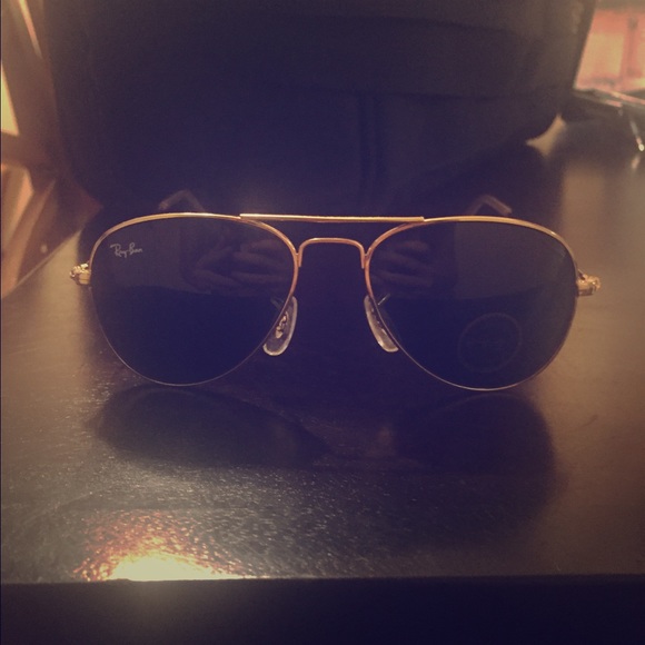 Gold and black Ray Bans