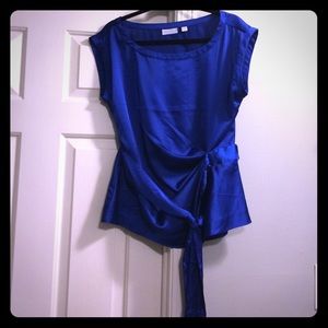 Silky looking cobalt blue blouse.