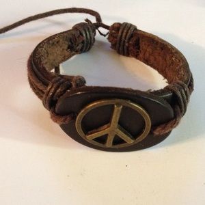 Peace sign and leather bracelet