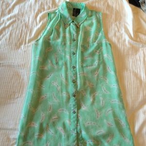 Sleeveless Bisou Bisou feather detail sheer top