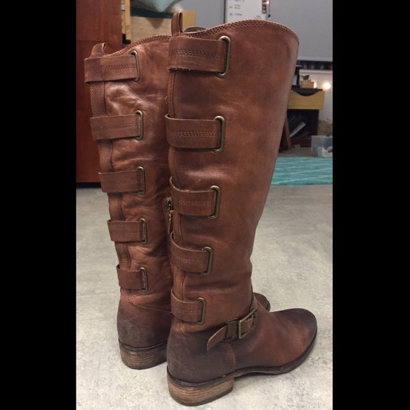 Unique riding boots with strap detail