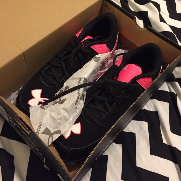 Under Armour softball cleats.