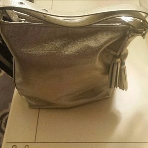 Gold, metallic Coach purse