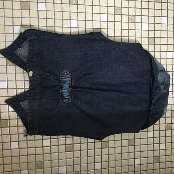 This is a denim vest - Picture 2 of 4