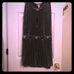 Beautiful dress black with white pearls