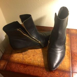 VC by Vince Camuto Signature Zip Ankle Book.