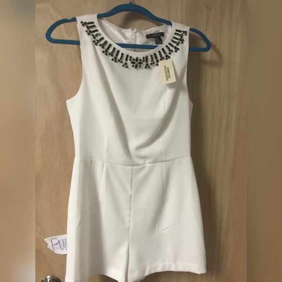 Forever 21 Dresses & Skirts - White with black gems romper