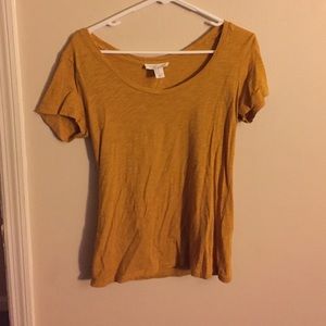 Mustard colored short sleeve shirt