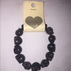 BRANDY MELVILLE SKELETON HEAD BRACELET