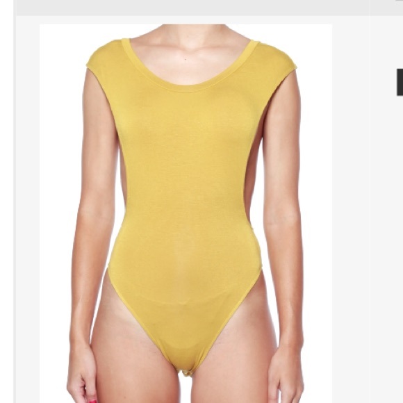 Mustard body suit with open sides ready.🌰🌾🍂