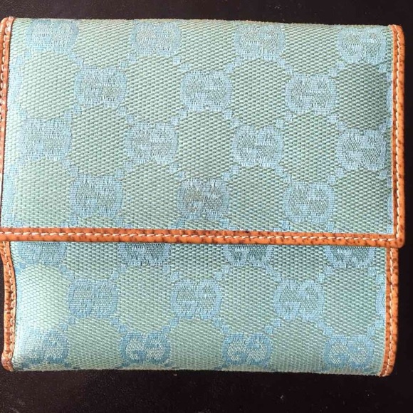 Gucci turqoise compact wallet