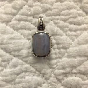 Two sided sterling silver pendant