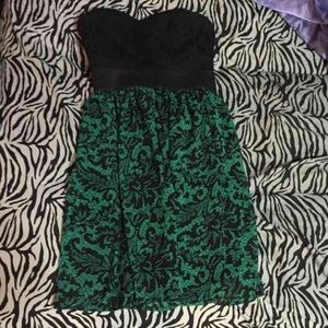 Greens an black dress