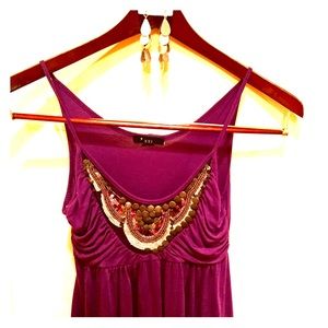 Purple power! Glitzy tank will make you sparkle!