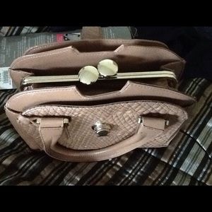 Ivanka Trump tan purse