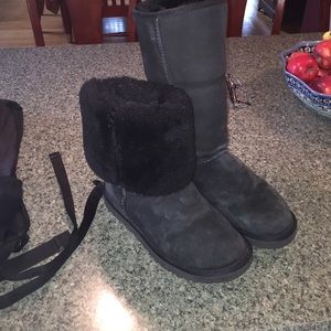 Tall black UGG boots