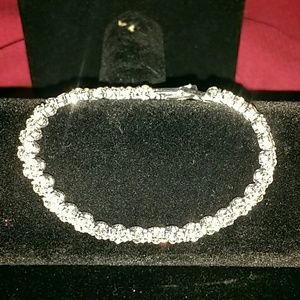 Stunning silver with rhinestone tennis bracelet