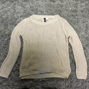Tan knit sweater, thin but very comfy!