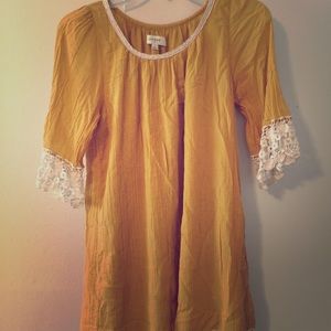 Yellow dress with lace trim