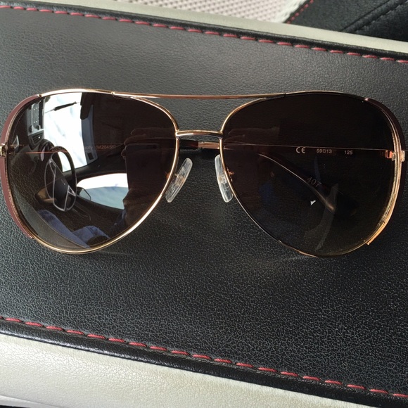 💯% Authentic Michael Kors Aviators Sunglasses.