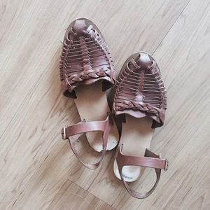 Strapped brown woven sandals