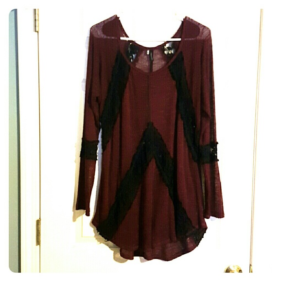 Maroon with black lace. Long sleeve. Worn once.