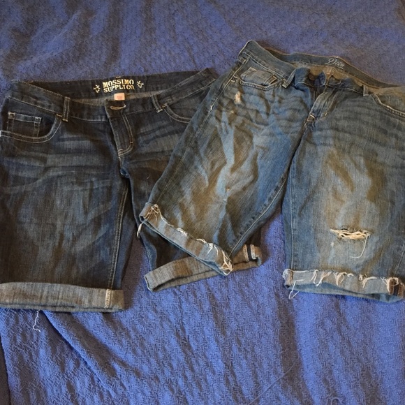 2 knee length pairs of distressed denim shorts