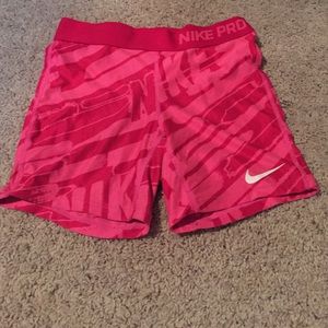 Holding these!! gently used nike pros!!