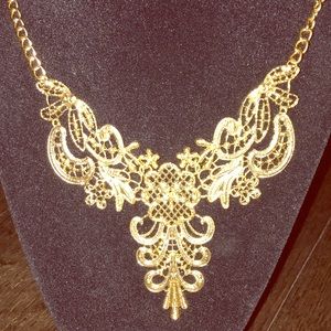 Gold costume necklace