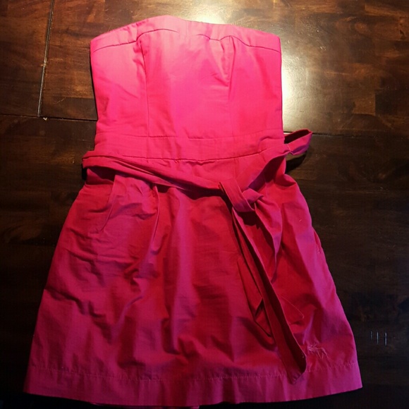 Strapless fuchsia dress.  Any questions or offers