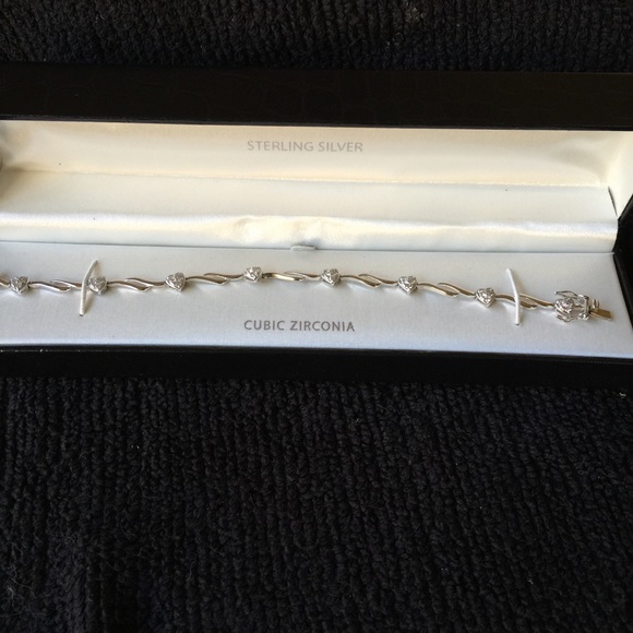 BRAND NEW! Never worn! SS with CZ bracelet