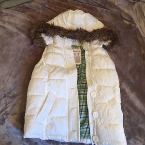 White puffy vest