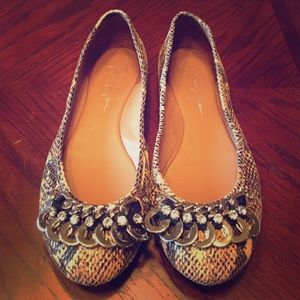 Snakeskin embellished flats